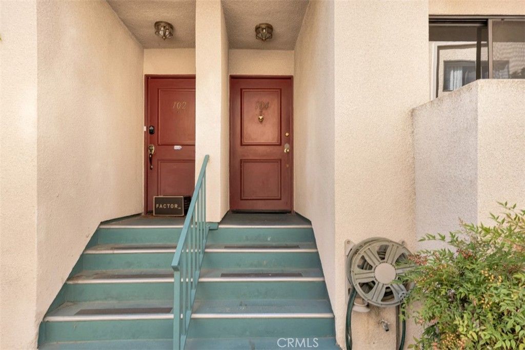 Photo of 17221 Chatsworth Street #104, Granada Hills, CA 91344 (MLS # SR25254897)