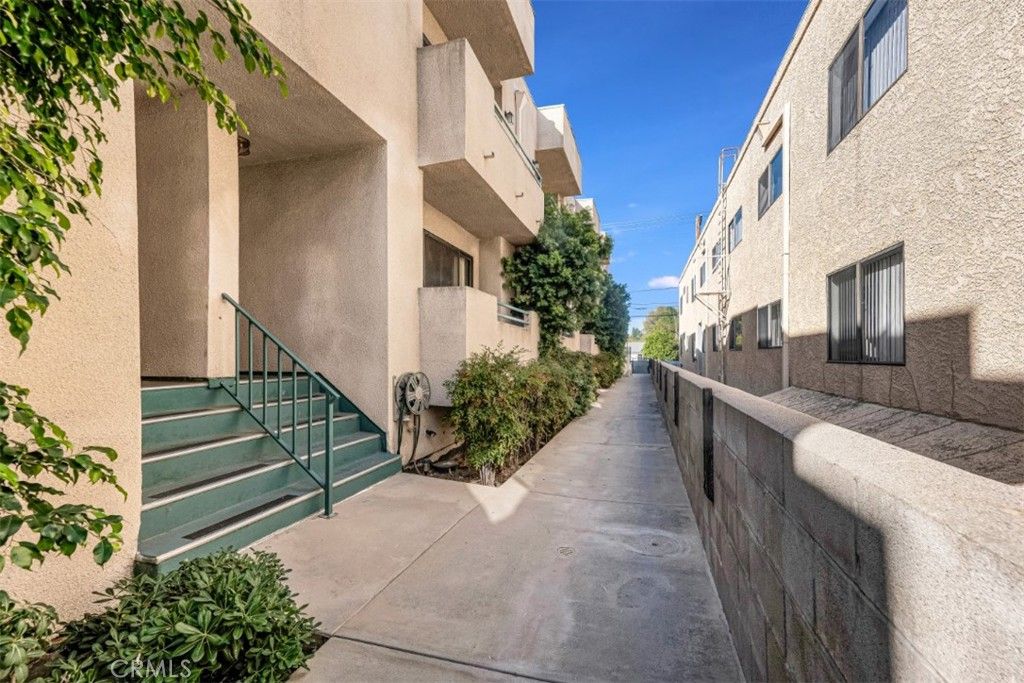 Photo of 17221 Chatsworth Street #104, Granada Hills, CA 91344 (MLS # SR25254897)
