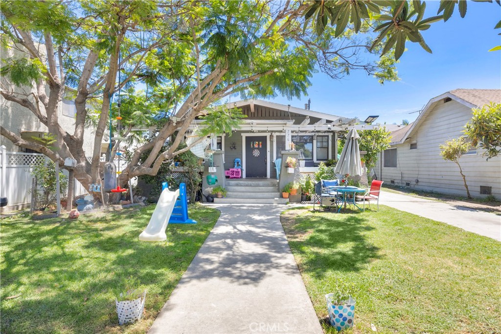 Three Charming Detached Homes in the Prime Rose Hill Historic Area of Long Beach! A Peaceful Residential Vibe! Perfect Owner User Setup With Rental Upside! Whether You're An Owner-User Dreaming Of Offsetting Your Mortgage Or An Investor Looking For Strong Rental Income, This Property Checks All The Boxes! Location, Charm, And Opportunity! The Front Home Is A Classic And Spacious 3 Bedroom, 2 Bathroom California Craftsman Built In 1912, Full Of Original Character, Hardwood Floors And That Warm, Timeless Charm! The 2nd Home Is A Spacious 2 Bedroom (Small 2nd Bedroom, Nursery, or Office), 1 Full Bathroom Cottage, Privately Set Back And Perfect For Steady Rental Income Or Guests! The 3rd Detached Home Is An Attractive And Cozy Studio With 3/4 Bathroom. There Is A Separate Car Garage That Could Also Be An ADU? Each Unit Has Its Own Personality, Private Entry, And Access On A Deep Lot With Mature Landscaping, Including A Gorgeous Jacaranda Tree! This is An Unbeatable Location Just Minutes From CSULB, Retro Row, Belmont Shore, 4th Street Shops, And The Beach. Fantastic Long-Term Tenants That Would Love to Stay, But Month-To-Month To Meet Your Goals! Rarely Do Properties Like This Come Available With So Much Versatility In Such A Prime Area. Tenants are wonderful and pay all utilities!