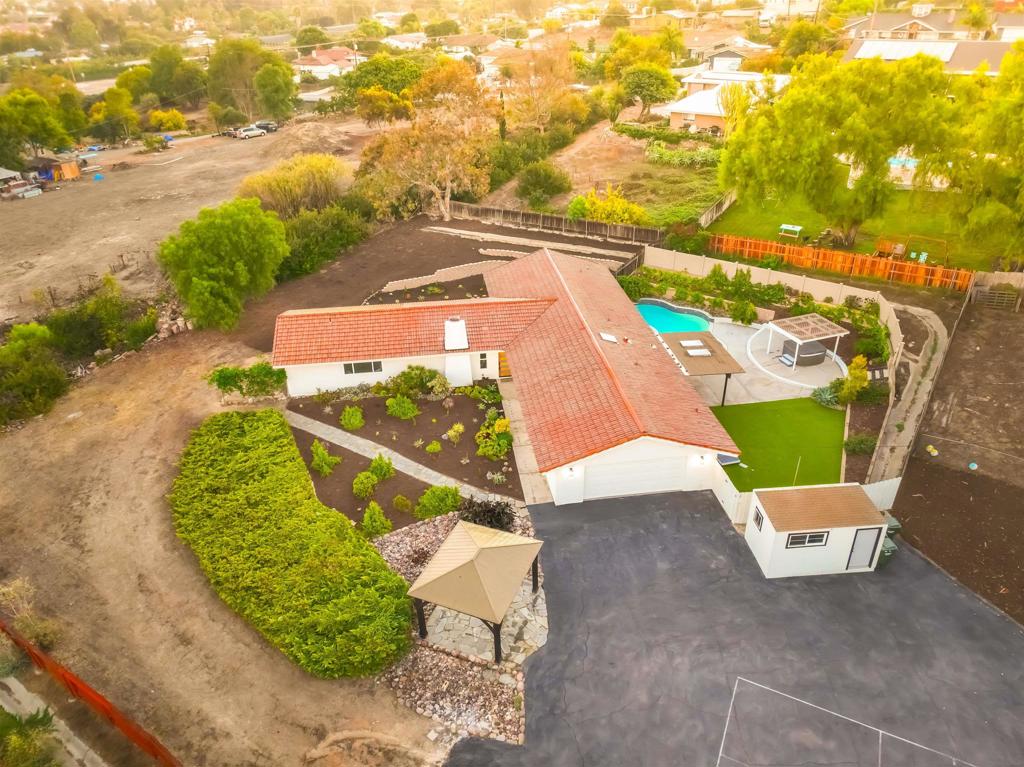 Highly Sought- Fully Remodeled Vista Retreat with Expansive Views. Nestled in the rolling hills of Vista, this private property offers stunning mountain views and nearly an acre of land—perfect for adding an ADU or creating your dream outdoor oasis. Enjoy your own private pool and spa, surrounded by ample space for entertaining and relaxation. The home features a spacious, open-concept layout designed for entertaining, with a seamless indoor/outdoor flow. The kitchen boasts a generous bar area that opens to the outside—ideal for hosting gatherings and serving guests with ease. Two ensuite bedrooms provide comfort and privacy, making this home as functional as it is inviting. Experience the best of Southern California living in this rare and tranquil retreat.