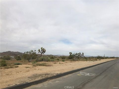 Photo of 6650 La Contenta Rd Road, Yucca Valley, CA 92284 (MLS # JT25263689)