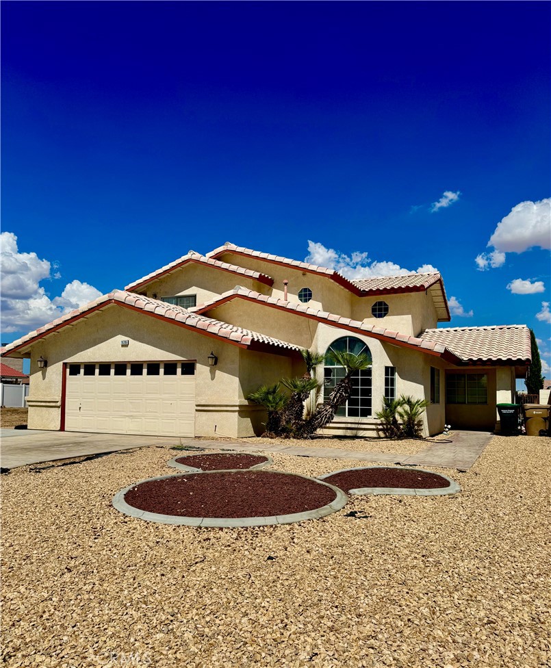 In the coveted Spring Valley Lake community, across from one of the lake's channels, awaits this gorgeous two story, four bed and three (full) bathroom home. On a large yet low-maintenance 7200sf lot, this beauty is just a few minute drive to the community's markets, restaurants and bars. Inside, you'll find a charming living room that calls for generous natural light, and a kitchen that opens up beautifully to the living room - the perfect layout for entertaining, and centers on the fireplace that is sure to create the perfect backdrop to the upcoming holiday's festivities - whether you're entertaining a large group, or prefer an intimate, at-home affair. Upstairs, the master suite doesn't disappoint. With a walk-in closet featuring several unique and efficient storage conveniences, an en-suite spa and separate shower, along with a patio that beckons an early morning coffee as you watch the sun come up. Across are two of the home's guest rooms, adjoined by a jack-and-jill bathroom. The fourth guest bedroom - in case you're wondering - is on the main story, as is a full bathroom, making for a convenient arrangement for those who wish to not live on the second story. Tucked behind the kitchen, you'll find the indoor laundry room - with ample built-in storage as well as a convenient desk for sewing, crafting, or any other hobbies you'd rather keep the mess hidden from view! This beautiful home is only missing you - let's call it home well before the holidays!