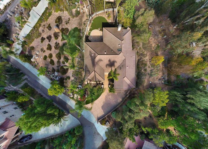 Beautiful 4 Bedroom El Cajon View Home on Expansive Cul-de-Sac View Lot Welcome to this stunning 4 bedroom, 2.5 bathroom, 2,519 sq. ft. home perfectly situated on a beautifully landscaped 27,442 sq. ft. cul-de-sac lot with sweeping views of the El Cajon Valley. Designed for both comfort and style, this home offers a spacious Primary Bedroom Suite, a separate Family Room with a cozy fireplace, and a formal Dining Room ideal for gatherings. The oversized modern kitchen features generous counter space, a pantry, and a seamless flow for everyday living or entertaining. Other features of this home include Jack & Jill bedrooms, a dedicated laundry room, dual pane windows, and a newer HVAC system provide convenience and efficiency throughout. Enjoy San Diego’s outdoor lifestyle from the large covered patio, perfect for relaxing or hosting while taking in the spectacular panoramic views. Additional highlights include an attached oversized 2-car garage, tile roofing, and thoughtful, mature landscaping surrounding the property. Conveniently located in one of El Cajon’s most desirable neighborhoods, this exceptional home combines space, comfort, and views in a private, peaceful setting.