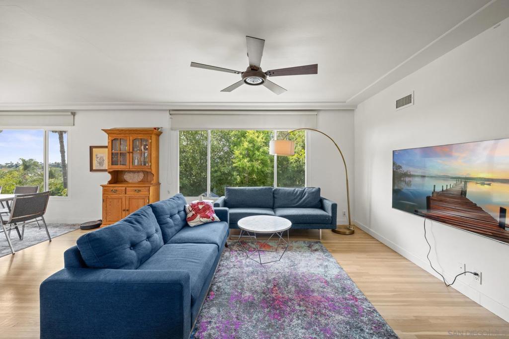 Discover the ideal mix of charm, convenience, and versatility in this La Mesa gem! Located just a short walk from vibrant La Mesa Village, enjoy easy access to trendy bars, restaurants, and shops—perfect for embracing community energy while maintaining suburban peace. Inside, this well-maintained home features 3 bedrooms and 2 full baths upstairs, ideal for family or guests. Highlights include stunning refinished original wood floors for timeless warmth, plus a newer roof and paid-off solar for efficiency and savings. Downstairs, an attached ADU provides flexibility with a full kitchen, 1 bedroom, 1 bath, and living area—great for family, income, or an office. The backyard offers a relaxing retreat with space for lounging, gardening, or dining outdoors. Mature vegetation provides natural privacy from neighbors, boosting the serene vibe. Seize this turnkey opportunity in a top La Mesa neighborhood. Schedule a showing today!