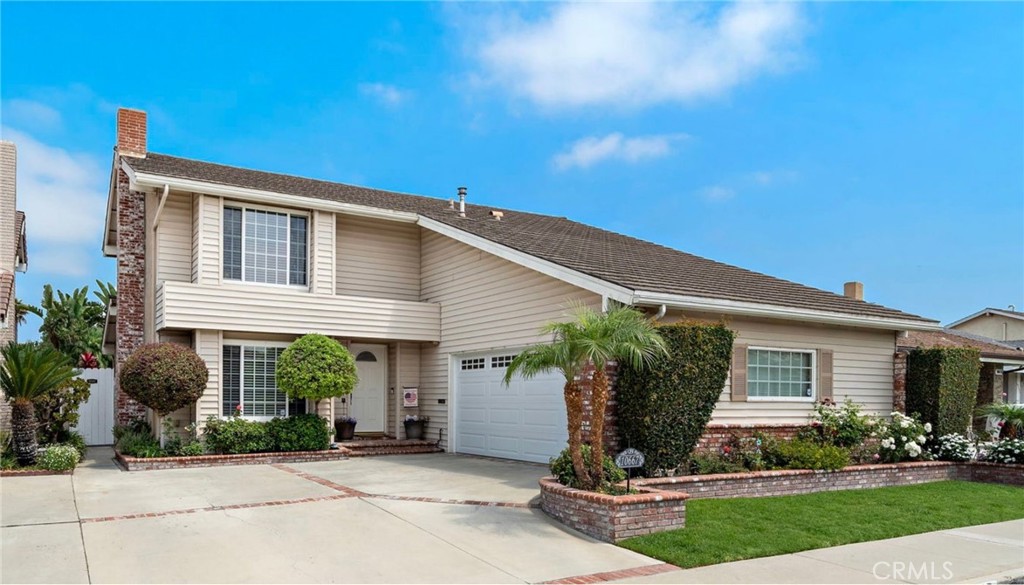 Beautifully upgraded and meticulously maintained, this exceptional 4-bedroom, 2.5-bath residence offers approximately 2,100 square feet of light-filled living space on a spacious lot in highly sought-after Green Valley. Enter through a custom door into a welcoming foyer with rich plank-style vinyl flooring and a striking custom oak staircase, complemented by custom crown molding, high baseboards, dual pane windows and sliders, wood blinds, and elegant window treatments throughout. The expansive formal living room features a charming window seat and a custom fireplace with mantel, while the addition of an adjacent office with soaring ceilings, skylights, and a slider to the resort-style backyard adds even more living space and functionality, especially for one working from home. The gourmet kitchen is a chef’s dream with granite countertops, custom cabinetry, upgraded appliances, a built-in wine cooler, and seamlessly flows to the formal dining area and inviting family room, all accented by ceiling fans and easy access to the entertainer’s paradise outdoor living space. Upstairs, the luxurious primary suite offers a serene retreat with a window seat, sitting area, walk-in closet plus a second mirrored closet, and a spa-inspired bath with granite countertop, dressing area, and a romantic tub/shower combination. All bathrooms have been beautifully remodeled with granite countertops and custom cabinetry, including dual sinks in the guest bath. Step outside to a private backyard oasis featuring a sparkling saltwater pool and spa with energy-efficient equipment, rock waterfall, lush tropical landscaping, brick accents, a huge covered patio with tile decking, built-in fire ring, and a natural gas barbecue center with burners and refrigerator—perfect for entertaining. The oversized finished two-car garage includes custom cabinetry, workbench, surround sound with speakers, and an added 250 sq ft finished attic room. Additional highlights include an energy-efficient tankless water heater, newer roof with a 50-year warranty, insulated vinyl siding with textured stucco, professional landscaping, automatic sprinklers, and an extra-wide driveway with brick accents. Enjoy beautiful curb appeal and an unbeatable location just steps to a neighborhood park, elementary school, and Green Valley’s community pools, spas, and clubhouses, all minutes to the beach, shopping, dining, and entertainment.