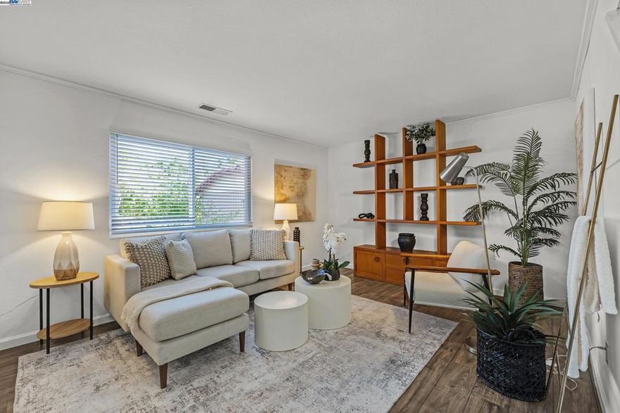 NEW PRICE! Move-in ready and updated throughout, you’ll love this spacious two-story townhome with patio and detached garage. The open concept layout provides a seamless flow between the formal living area and kitchen-family room combo. The kitchen offers a sleek and modern aesthetic with quartz countertops, custom cabinets, stainless steel appliances, and barn door to easy inside laundry area. Enjoy and engineered wood flooring throughout the lower level, adding warmth and a contemporary touch. Upstairs you’ll find a generous primary bedroom with bathroom and walk-in closet and park views, as well as 2 more guest bedrooms and hall bath. Relax or entertain on your private backyard patio or head across the street for more fun at Tawny Park with expansive lawn, sport courts, play structure, and walking path. Embrace comfort, convenience, and low-maintenance living in one of Pleasanton’s most charming communities. The Vintage Terrace location is unbeatable–minutes from picturesque parks and trails, shopping centers, top-rated schools, vibrant downtown, and easy access to 580/680/84.