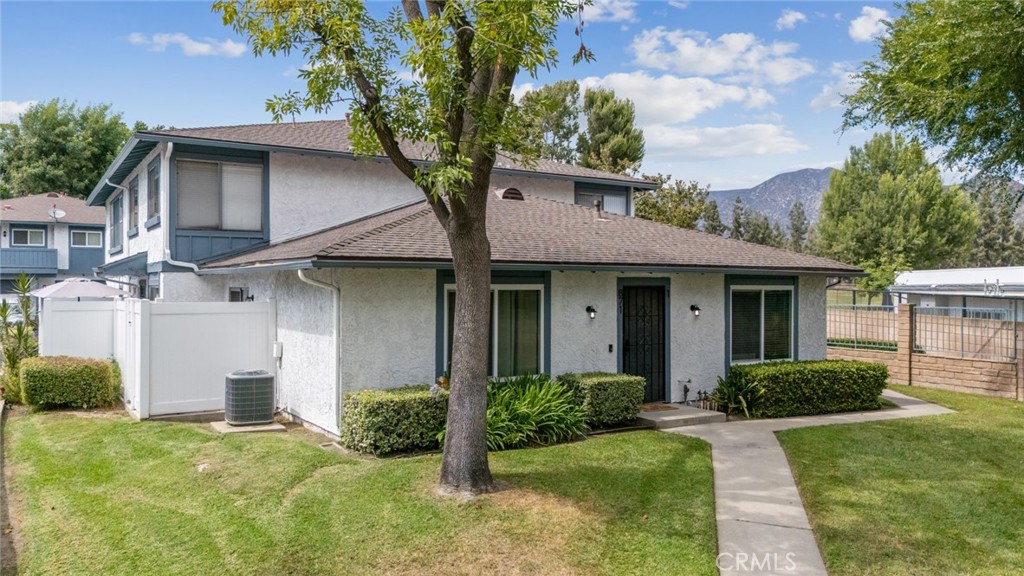 Enjoy your private patio and beautiful sunsets from this move-in ready 2 bedroom, 1 bath home in desirable North Azusa with mountain views. As a corner unit with its own manicured front yard and street presence it has a pleasant single-family feel. This adorable condo boasts a modern rejuvenated interior; including open concept living-dining spaces, a fully remodeled bathroom, fresh paint, custom closet organizers, and easy-to-maintain flooring that runs throughout. Upgraded air-conditioning adds to the home’s comfort and livability. The complex is ideally located near the beautiful foothills, hiking trails, golf course, and local shopping. Additional pleasant surprises include a recently painted exterior, access to a beautiful pool, landscaping, and other amenities.