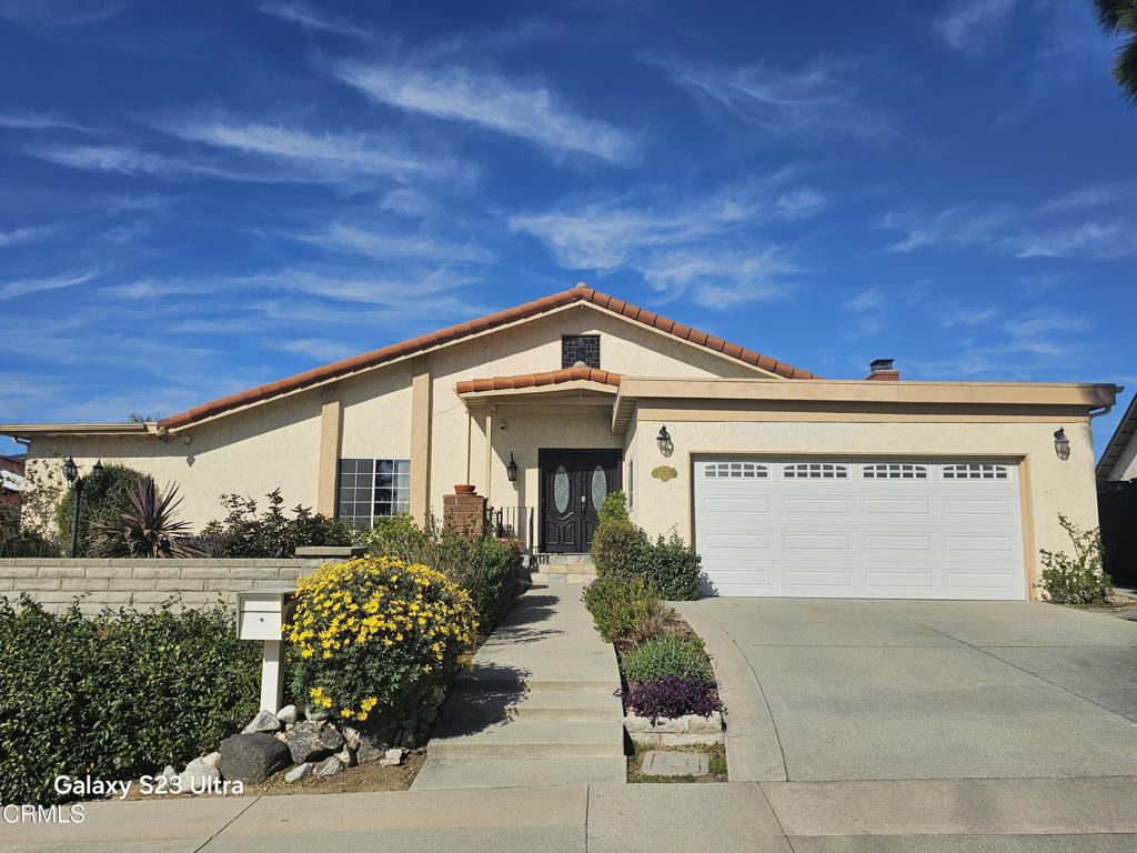 We highly recommend this home if you're searching for a safe, family-oriented, and comfortable neighborhood, especially with its access to one of the best school districts for your children: La Canada Schools. Official announcements state that while a permit needs to be applied for with the education department for the 2025-2026 academic year, this property will be directly within the La Canada school district starting July 1, 2026. Please note that tenants are responsible for verifying this with the La Canada education authorities. This charming four-bedroom, two-and-a-half-bathroom, single-level home in La Canada Flintridge resides on a corner lot where two cul-de-sacs meet. Upon entry, double doors reveal an exquisite foyer, distinguished by a double-height ceiling, marble balustrades, and elegant tile flooring. The formal living room and dining room provide a welcoming ambiance with their high vaulted ceilings and a warm fireplace. A hallway leads to the generously sized bedrooms. The master suite is a true retreat, featuring a high vaulted ceiling, a dedicated sitting area, direct access to the backyard, and a luxurious master bathroom complete with a double sink, separate shower, and spa tub. The grand kitchen is a chef's delight, showcasing tile floors, stainless steel appliances, granite countertops, a dishwasher, microwave, wine cooler, and a convenient breakfast bar. The family room, with its tile flooring and soaring ceilings, seamlessly transitions to the delightful backyard. The private, fenced yard is adorned with fruit trees and offers captivating mountain views.