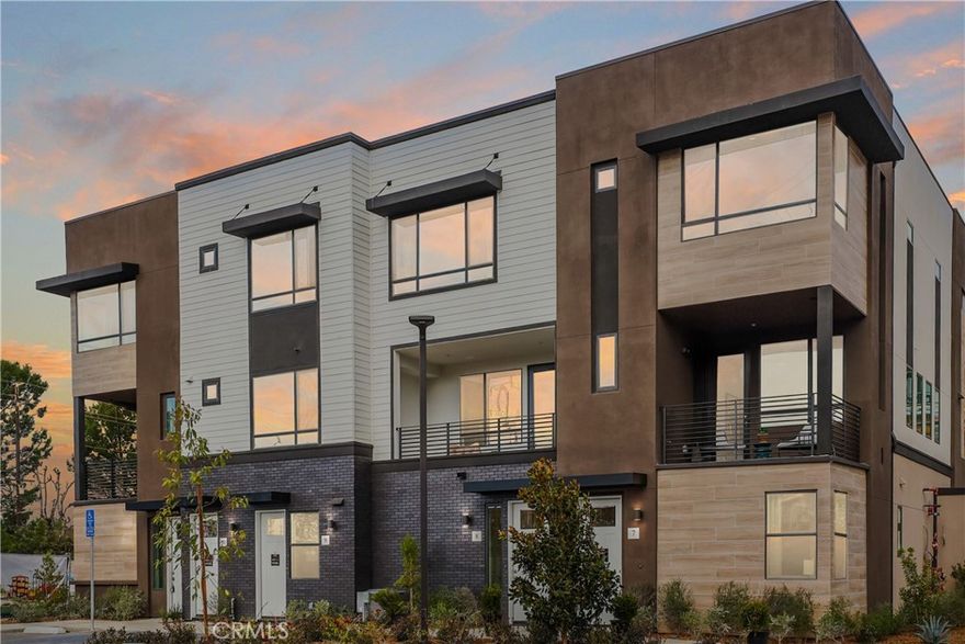 NEW TOWNHOME in a GATED community by Bonanni Development in Stanton, close to Rodeo39 and the 22 Freeway.  This is a top floor condo offers all of the all living areas on one level, with an direct entry off the garage space.  One bedroom and one bath with a great room design and private deck. This Plan 1A is light and bright with your choice of finishes, for a Early 2026 move-in. The great room design flows into the kitchen with a generous kitchen and peninsula countertop - see pictures for floorplan.  Plus stainless steel dishwasher and high demand gas range.  Convenient interior laundry area off of the entry/garage. Built with state of the art technology, high speed wiring throughout, plus new appliances, cabinets and flooring.  SOLAR PANELS INCLUDED IN PRICE! 



This gated community will have three unique parks for homeowners to enjoy including a private dog park!



Photos are of the models.