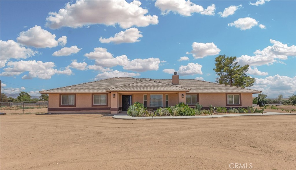 Welcome to this well-maintained 3-bedroom, 2-bathroom home nestled on a sprawling 35,425 sq. ft. lot in the heart of Apple Valley. With 2,274 sq. ft. of living space, this home offers plenty of room to live, relax, and grow. Inside, you'll find a functional floor plan with generously sized bedrooms, a spacious living area, and convenient in-home laundry hookups.Enjoy energy savings year-round with fully installed solar panels. The expansive lot offers endless possibilities, whether you dream of adding a pool, building a workshop, or simply enjoying the wide-open space. Whether you're a first-time buyer or looking for more room to spread out, this property offers a unique blend of space, comfort, and long-term value.