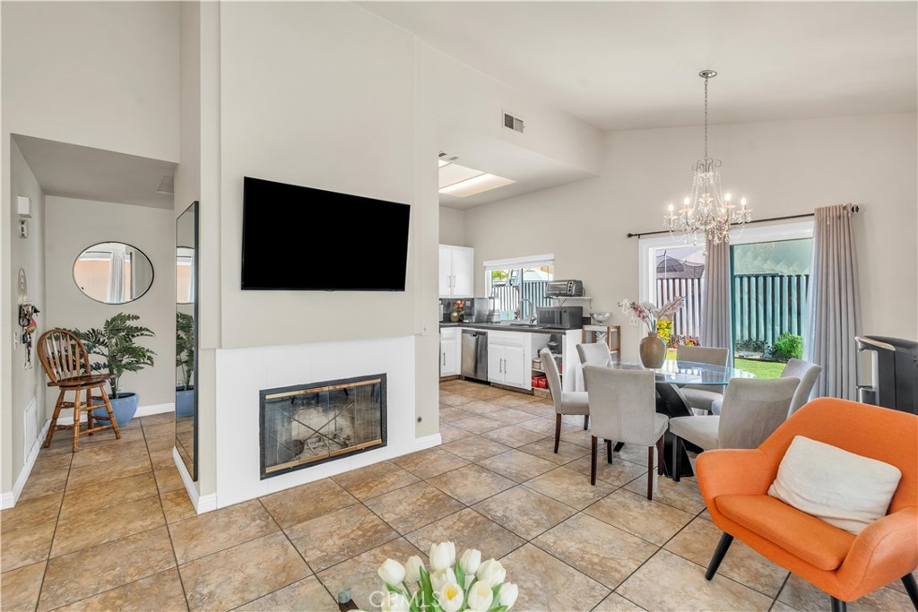 Beautifully maintained and move-in ready, this single-story Perris home offers 2 bedrooms, 2 full bathrooms, and an attached 2-car garage. Recent updates include fully paid-off solar panels, energy-efficient dual-pane windows, new flooring, fresh interior and exterior paint, and freshly painted kitchen cabinets and baseboards. The layout features a spacious living room with fireplace, dining area, and a functional kitchen with plenty of storage space. The laundry area is located in the garage. Additional amenities include central heating and air, and a private backyard. Convenient location near schools, parks, shopping, and major commuter routes. No HOA or Mello-Roos.