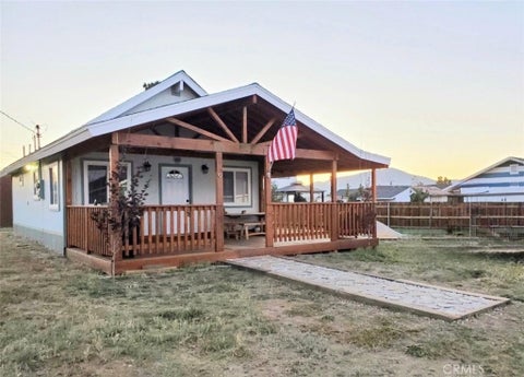 Photo of 813 Pinon LN, Big Bear City, CA 92314 (MLS # CV26224032)