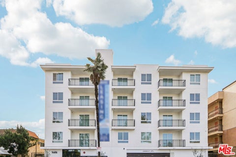 Photo of 14606 Sylvan Street #503, Van Nuys, CA 91411 (MLS # 26673771)