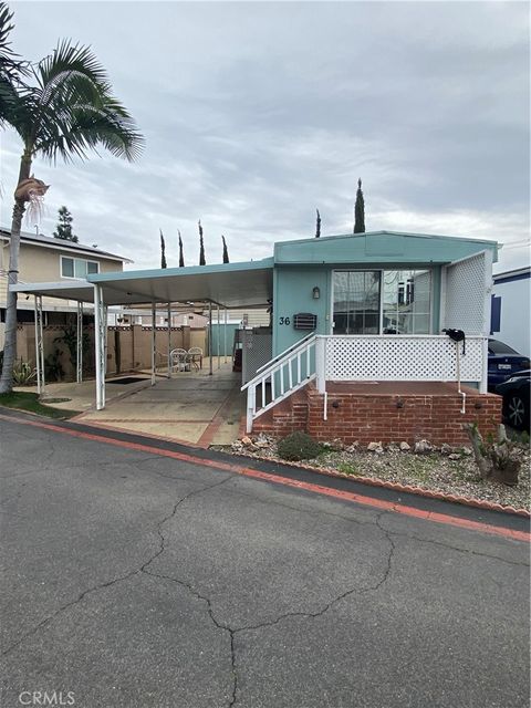 Photo of 1801 E Collins Avenue #36, Orange, CA 92867 (MLS # OC26035055)