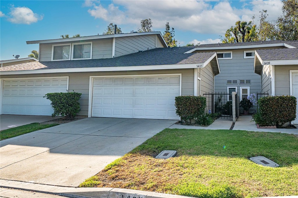 LOVELY SPACIOUS TOWNHOME WITH NO ONE ABOVE OR BELOW YOU Living room with a fireplace and dual pane sliders opening to a private backyard with a view. Downstairs bedroom off living room could also serve as an office or den. Two bedrooms upstairs including a large primary suite with vaulted ceilings. Newer carpet and new kitchen stove and dishwasher. Attached two car garage with direct access and washer/dryer hook-ups. Complex has two pools and a clubhouse with low monthly dues. Central location near the 605, 10, 60, and 57 Freeways and close to both Cal Poly and Mt Sac colleges! Be sure to check this one out!