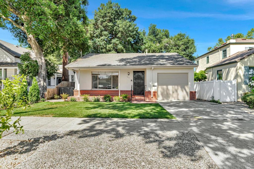 Nestled in the heart of historic Monterey Street, this delightful 2-bedroom, 1-bath residence offers timeless character, thoughtful updates, and a genuine sense of community. From the moment you arrive, youll be greeted by mature landscaping, a welcoming front porch, and undeniable curb appeal. Step inside and youll find gleaming hardwood floors, natural light pouring through the windows, and a cozy yet functional layout perfect for both quiet mornings and casual gatherings. The spacious living area flows effortlessly into a bright kitchenideal for whipping up your favorite meals while staying connected to the heart of the home. Lovingly maintained and move-in ready, this home reflects pride of ownership throughout. Whether youre a first-time buyer, downsizer, or savvy investor, this is a rare opportunity to own a home in one of Hollisters most established and neighborly communities. Enjoy tree-lined streets, a short stroll to local shops and parks, and the warm camaraderie that only a true hometown neighborhood can provide. Dont miss your chance to fall in love with this Hollister gemschedule your private tour today!
