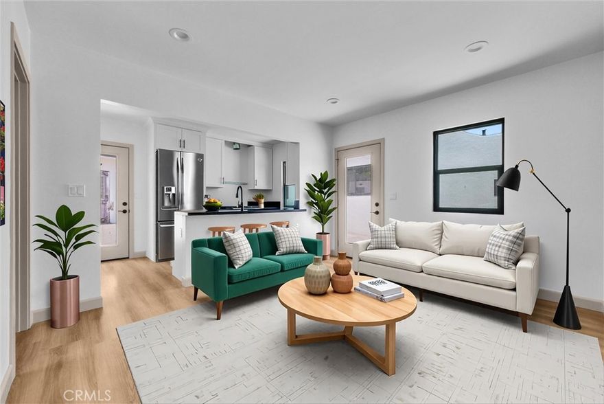 Stunning Renovated Guest House/ADU. The detached 550 sq. ft. guest house offering complete privacy and its own laundry area.