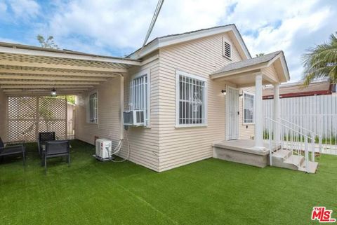 Photo of 1165 W 38th Street, Los Angeles, CA 90037 (MLS # 26834403)
