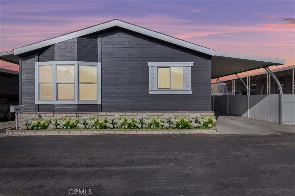 Photo of 9080 Bloomfield Ave #126, Cypress, CA 90630 (MLS # IG26072443)