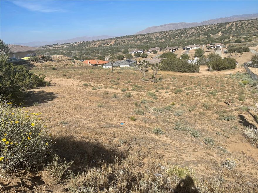 This land has the blueprints ready for the installation of a three-bedroom, two-bath mobile home. The lot is in the prestigious Las Mesa area, zoned R1 residential.