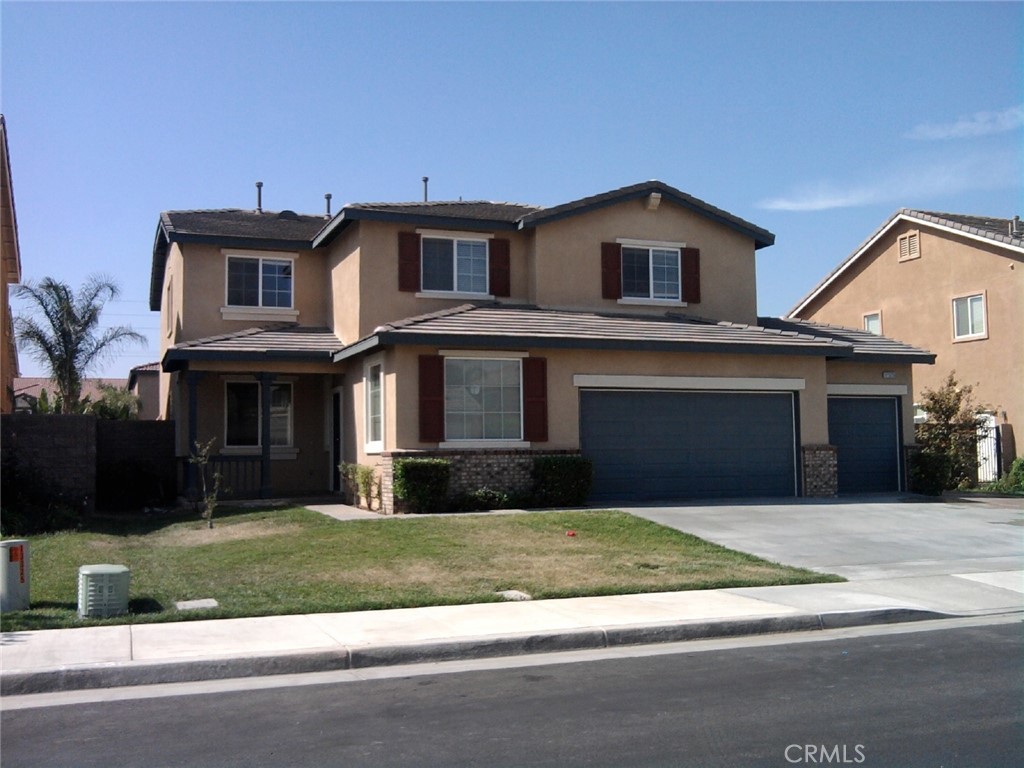 Updated 4 Bedrooms 2.5 Baths 3.5 Car garage in Eastvale. Downstairs has a spacious office space additional to ample space living room and family room. Upstairs has a great family entertaining open bonus room. New laminate wood floor through out, no carpet. New paint. 2 full bathrooms have new vanity cabinet, counter, mirror, light set. Formal dining area and a family dining space too. Kitchen has stainless appliances, new microwave and range, walk-in pantry, and spacious working area. Large individual laundry room downstairs. Garage fits 3 cars plus extra/work storage area and top storage space. Drive way for 4 cars plus a RV/boat space behind side gate. Backyard has a large patio area for entertaining. Minutes to 3 grade schools, Eastvale Gateway shopping area, easy freeway access. House is ready to move in.