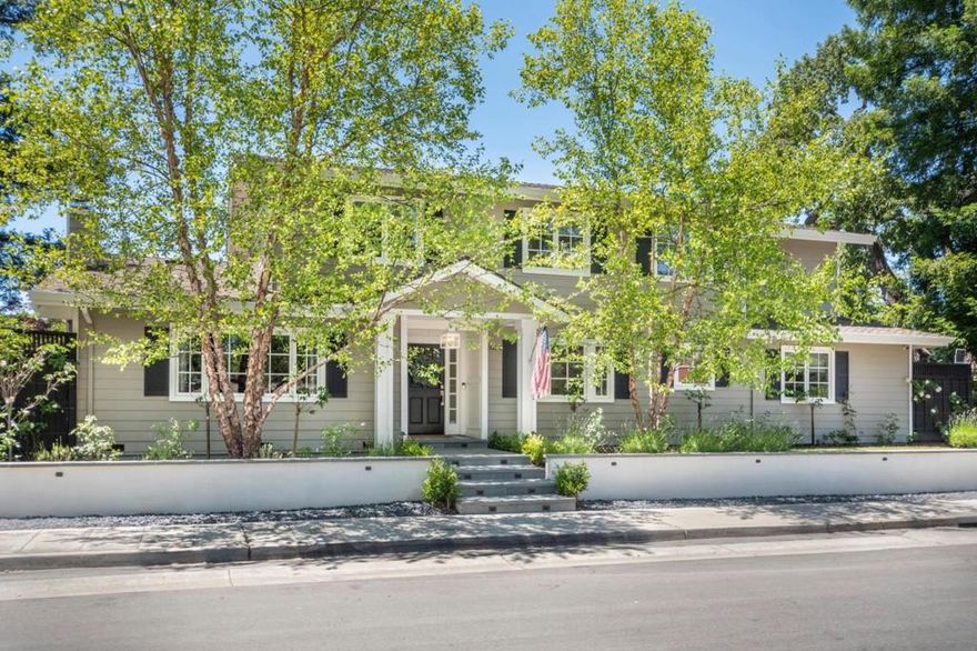 This stunning Menlo Park home,situated on a corner lot with meticulous landscaping, impresses with its exterior charm and masterful design. Upon entering, the elegant floor plan features a handsome living room with a fireplace and formal dining room. Design elements continue throughout: wainscoting, custom moulding, hardwood flooring, picture windows. The hallway extends to the family room/kitchen with a vaulted tongue and groove ceiling and doors that open to the yard.  A chef's kitchen delight with stone countertops, high end Viking appliances, island, banquette seating, and butler's pantry that has a dedicated office space!  The first floor boasts an ensuite bedroom with a renovated bathroom, walk-in closet, private yard and separate entrance. Also found on first floor is a private office with yard access. The second floor comprises three bedrooms, two bathrooms and a laundry room. The primary has a remodeled bathroom that includes a soaking tub, stall shower, double vanities and specialized cabinetry. The yard astounds with its high-end outdoor kitchen, dining space, lawn and deck running along side the home, ideal for indoor/outdoor living and entertainment. Award winning Las Lomitas school!  County records show 3116 sq ft. Floor Plan Visuals show over 3200 buyer to satisfy