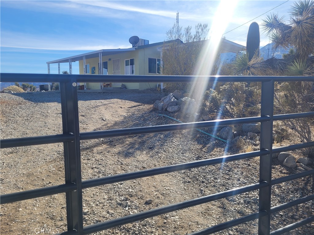 This cozy 2Bd/1Ba cottage-style home sits high above Lucerne Valley, offering stunning views of the valley and San Bernardino Mountains. The open floor plan features a comfortable living room and kitchen, with a covered porch perfect for enjoying the scenery.
A large detached garage provides plenty of space for a workshop, craft room, or extra storage. The 4.2-acre lot offers room to roam and enjoy outdoor activities.
Just 10 minutes to Lucerne town center and a short drive to Big Bear and nearby mountain resorts.