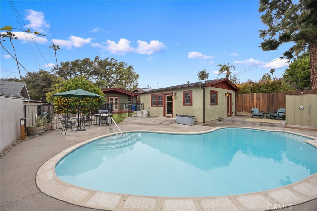 This charming newly constructed, fully furnished 1-bed, 1-bath ADU is located in the heart of Pasadena’s coveted Bungalow Heaven neighborhood. Combining the original character of the early 1900s Pasadena craftsman-style bungalows and the modern features & amenities of new construction, this property truly has it all. The unit features a cozy living room and adjacent kitchen with bar-top dining/seating. There is 1 bedroom with ample closet space and attached bathroom with a large walk-in shower. Among the many amenities of this spectacular ADU are wood floors, ductless split-system heating & air in both the living room and bedroom, high-end kitchen appliances, in-unit stackable washer & dryer, TV & sound bar and much more. The fully-furnished unit comes with barstools, pull-out sofa bed in the living room, queen bed with new mattress in the bedroom, all appliances, all kitchen utensils, dressers/cabinetry, and many other essential items. The unit also comes with 2 parking spaces, additional storage, a Ring doorbell, outdoor patio area with BBQ, and access to the swimming pool. This property is truly move-in ready and has everything that you could imagine for fully-furnished resort-style living in a private & highly-desirable location.