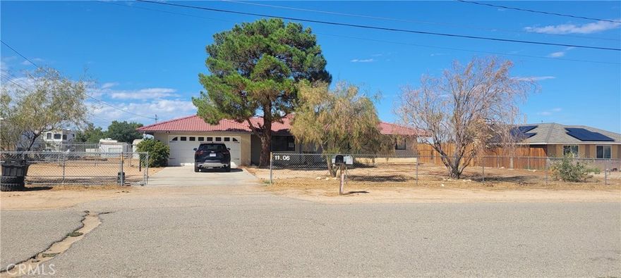 3BD 2BA in the affordable city of Hesperia! Nearly an acre property! Close to Main Hwy, Frwys, Shopping and restaurants. Electric entry fence provides security and ease of entry. Two car garage split into Workshop. Can be returned to two car garage! Newer A/C unit and Hot Water Heater, High Efficiency. All Appliances stay! A blank canvas for your ideal back yard. Zoned for animals/Goats/Chickens/Horses. Plenty of room to ad an ADU!  Needs a little updating. Great view of the sunset while sitting on your back porch!