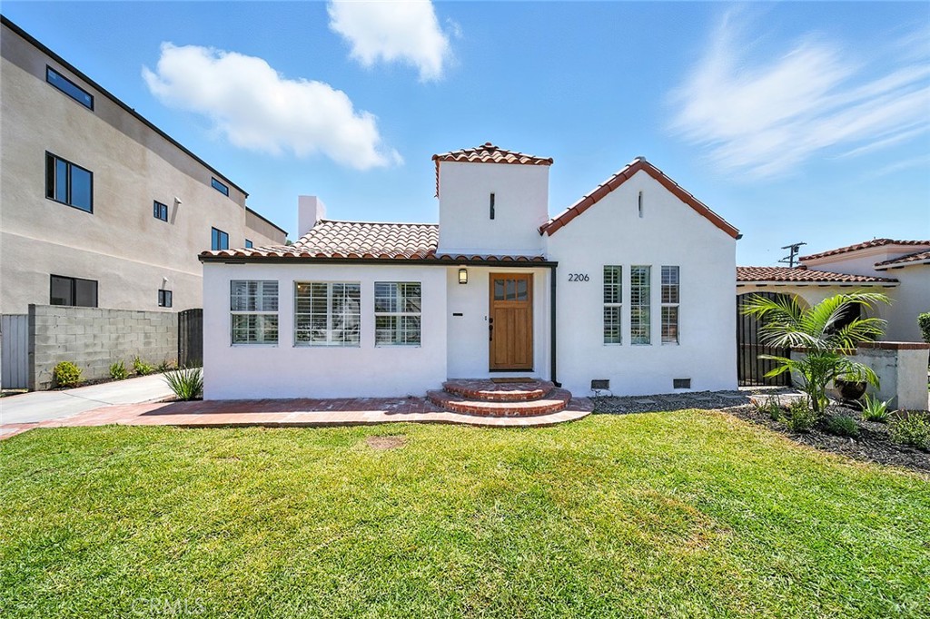 Completely remodeled 3 bedroom 2 bath home located in desirable Morningside Park area. This spanish style gem has an open kitchen with a nice size island, new appliances, quartz counter tops, and new custom cabinets. Master bedroom was just built with new flooring, recess lighting, new windows, and large closet. Master bathroom has a walk-in shower with beautiful subway tile everywhere, new glass barn style shower door. Second bathroom is large with walk-in shower, new glass shower door, new vanity with quartz counter top. Beautiful tile flooring in both bathrooms. Brand new AC and heating unit. Separate laundry room off the kitchen plus a bonus "office/ kids play room" in the front. Brand new laminate flooring through out. Custom window shutters and all new lighting. HUGE LOT with a single detached garage that is used as a studio or office space, plus there is a bonus carport parking space just to the side of garage. Garage has new roof. Lot is so big you can add another unit, ADU, and a pool. The possibilities are limitless. RV access allows to park multiple cars off street, plus it's gated. Lovely landscaping in front gives the property great curb appeal. Centrally located to SOFI and KIA forum. Don't miss out!!