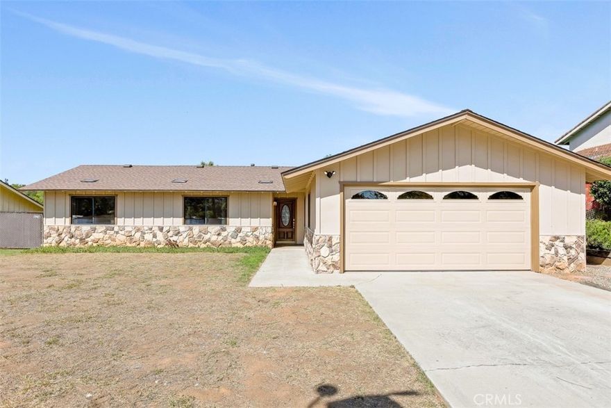 Fallbrook Gem! Exceptional single-story turnkey home offers the ideal combination of privacy, convenience, and modern comfort. Thoughtfully updated throughout, the residence features five bedrooms and three full baths, including a spacious bonus addition with its own private access —perfect for guests, a home office, or multi-generational living. The recently remodeled kitchen showcases contemporary finishes and opens to a welcoming in-kitchen dining area and breakfast bar, while the family room offers a cozy fireplace and direct access to the expansive pool sized backyard. Recent upgrades include a new roof installed in 2024 with a transferable 10-year warranty, a brand-new AC system, a replaced furnace, and a newer water heater, all contributing to year-round comfort and peace of mind. A freshly painted interior and exterior enhance the home’s inviting appeal, with a spacious garage. Situated on a generous .30-acre lot at the end of a quiet cul-de-sac. This 1,808-square-foot home is just minutes from town yet feels wonderfully private. With its blend of thoughtful updates and versatile living spaces, this move-in-ready property is a rare opportunity. See agent notes for details on the two bedrooms and bath currently not reflected in public records.