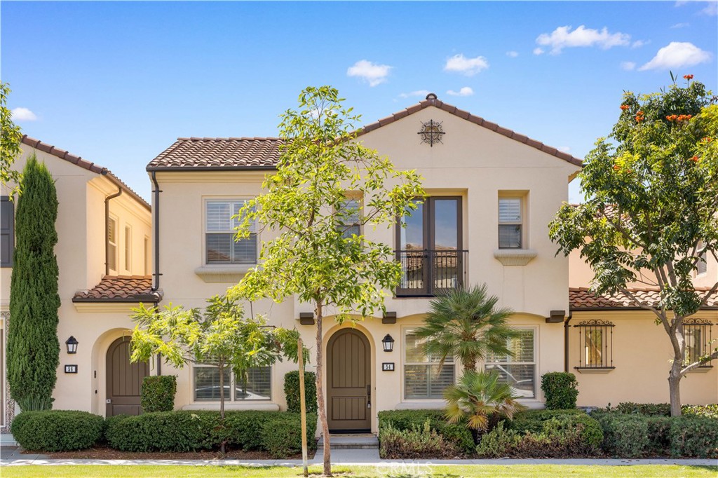 Welcome to 54 Jade Flower in Cypress Village — a beautifully designed 3-bedroom, 3-bathroom home offering 1,619 sq. ft. of modern living in the desirable Caserta community. This open-concept floor plan features a spacious living area that flows seamlessly into the contemporary kitchen, creating the perfect space for gatherings and entertaining. A highly sought-after main floor bedroom and full bath provides flexibility for guests or a home office. Upstairs, two additional bedrooms each feature their own ensuite bathroom, along with a convenient laundry room. The primary suite includes a relaxing bathtub and abundant natural light. Upgrades include new laminate flooring and plantation shutters throughout, enhancing both style and functionality. The home also offers an enclosed patio with additional storage and a two-car garage. Residents of Cypress village enjoy access to resort-style amenities, including sparkling pools, spa, lush parks, and scenic walking trails. Located within the boundaries of award-winning Cypress Village Elementary, Jeffrey Trail Middle, and Irvine High School, this home also provides easy access to freeways, toll roads, shopping, and dining.