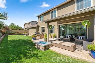 Nestled in the village of Pavilion Park, this stylish detached residence with charming curb appeal boasts a desirable PRIVATE location with NO NEIGHBOR behind and Greenbelt views. RECENTLY UPDATED this generous floor plan inspires comfortable living and entertaining with expanded chef’s kitchen featuring extensive counter space and cabinetry, stainless appliances including built-in refrigerator, and large island overlooking casual dining and spacious great room. This home’s open layout makes a striking impression with desirable main floor bedroom and bath, flex room that could be used as office/den/ music/playroom, upstairs loft, and breathtaking upgrades with no expense spared including gorgeous wide-planked laminate wood floors and upgraded carpet. Relax and recharge in your luxurious master suite and spa-like bath with soaking tub and separate shower. Family room framed by walls of windows looks onto lush garden views of the enchanting backyard adjacent to greenbelt. Guests will be captivated by the inviting outdoor living space with built in BBQ and covered patio. Generous-sized secondary bedrooms and convenient upstairs laundry enrich your life and your home’s value and offer comfortable living space for the entire family. Within the highly acclaimed Irvine School District and just steps from the park and resort-style amenities in all Great Park neighborhoods including pool and spa, sports courts and tot lots, this model-like home is a rare opportunity at this price.