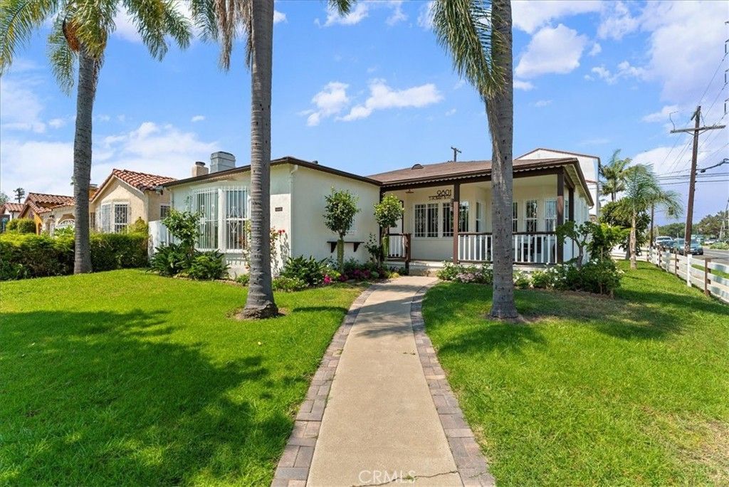 Photo of 9801 S Hobart Boulevard, Los Angeles, CA 90047 (MLS # OC26047306)