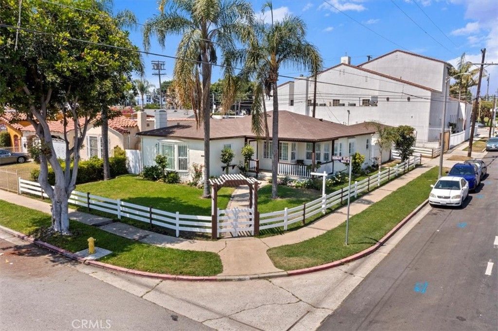 Photo of 9801 S Hobart Boulevard, Los Angeles, CA 90047 (MLS # OC26047306)