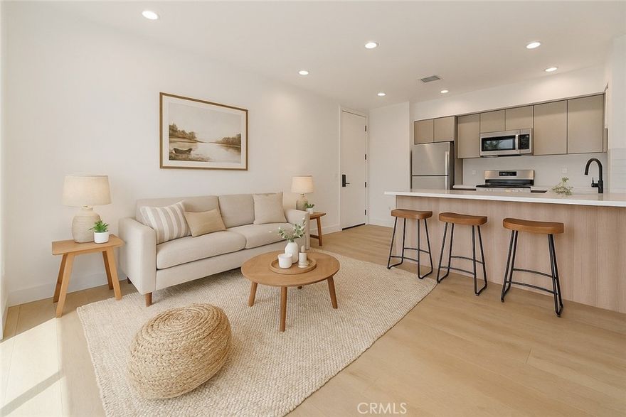 Experience the finest in modern living in this brand new, luxury 3 bedroom, 2 bathroom apartment located in a prime Van Nuys location. The unit features an open-concept design where the designer kitchen with high-end finishes flows seamlessly into the spacious living room, highlighted by large sliding window doors leading to a private patio. Enjoy the unparalleled convenience of an in-unit washer/dryer, secured building access, and premium finishes throughout, all while benefiting from the ideal location with rapid access to the 405 and 101 freeways.
