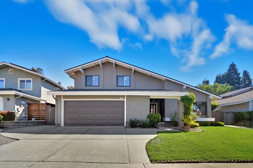 Discover this charming two-story home nestled in the serene Fremont foothills! Offering ample space and an array of modern features to suit your lifestyle. Step inside to find a recently updated interior, featuring a newer roof, energy-efficient solar panels (owned, with NEM-2 until 2041), and an upgraded furnace/AC system to keep you comfortable throughout the year. Enjoy an open floorplan with high ceilings that creates a spacious and airy atmosphere. The gourmet kitchen is a chef's dream, equipped with a Dacor 48" six-burner gas range, dual electric ovens, a Bosch built-in refrigerator, and a spacious granite island with prep sink. Entertain guests on the Trex decking and balcony, or take a refreshing dip in the deep in-ground pool. The outdoor space is illuminated with low voltage lighting, adorned with multiple fruit-bearing trees, and includes a large rubber mulch area. Notable features include a full bath and guest bedroom with murphy bed downstairs, French drains, extensive attic storage, and fresh paint throughout. This home is the perfect blend of comfort and elegance!