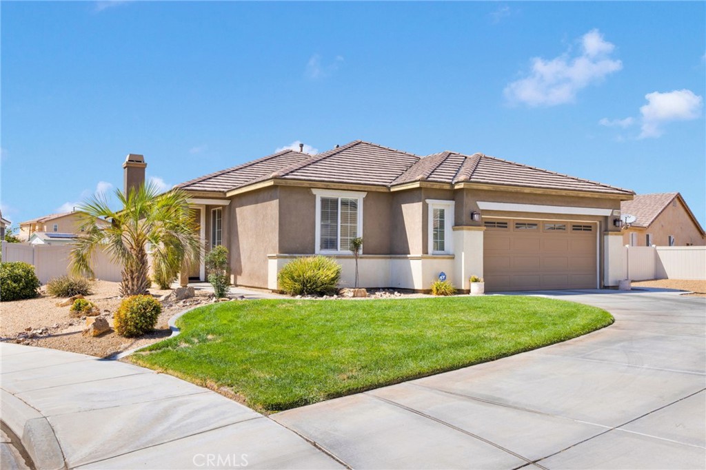 EXCELLENT OPPORTUNITY TO OWN THIS AFFORDABLE HOME! MOVE-IN READY! Pride of ownership. Bright and open floorplan. Great room with fireplace Newly remodeled kitchen with added dovetail cabinets and drawers with auto soft-close, stainless steel appliances and breakfast bar. Indoor laundry room with storage. Split floorplan. Master bedroom with walk-in closet. Master bath with separate tub and shower. Tastefully decorated. Easy care laminate flooring, tile and carpet. Den/office could be third bedroom with added closet. Located on a cul-de-sac. Large lot, almost 11,000 square feet. Beautifully landscaped yard with vinyl fencing. Oversized garage and covered patio. Conveniently located close to shopping, schools and minutes to the I-15 freeway and Highway 395.
