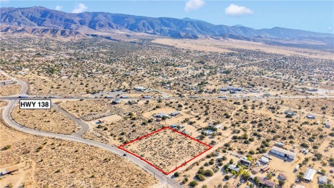 Photo of 875 Locust Road, Pinon Hills, CA 92372 (MLS # HD26136371)