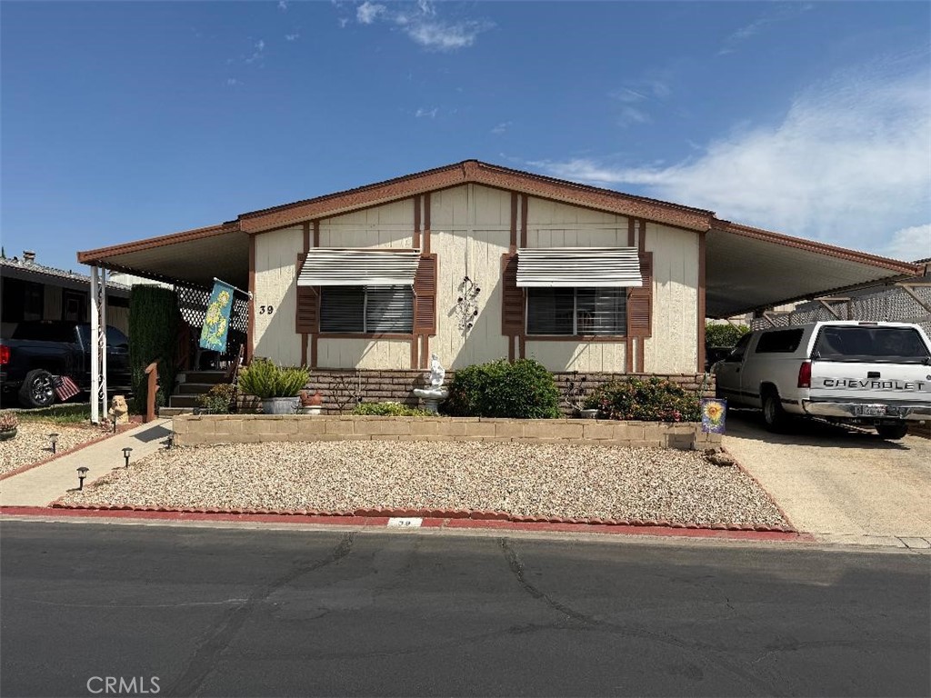 Welcome to the beautiful 55+ Rancho Ontario Mobile Home Park. Great home with a backyard. 2 beds, 2 baths, large master bedroom. Well kept home. This home features new: air conditioner, furnace, and water heater. Some of the carpet is newer. open and airy floor plan. Remodeled club house with two jacuzzies, heated swimming pool, lush landscaping, pickle ball courts, two dog parks, bocci ball.