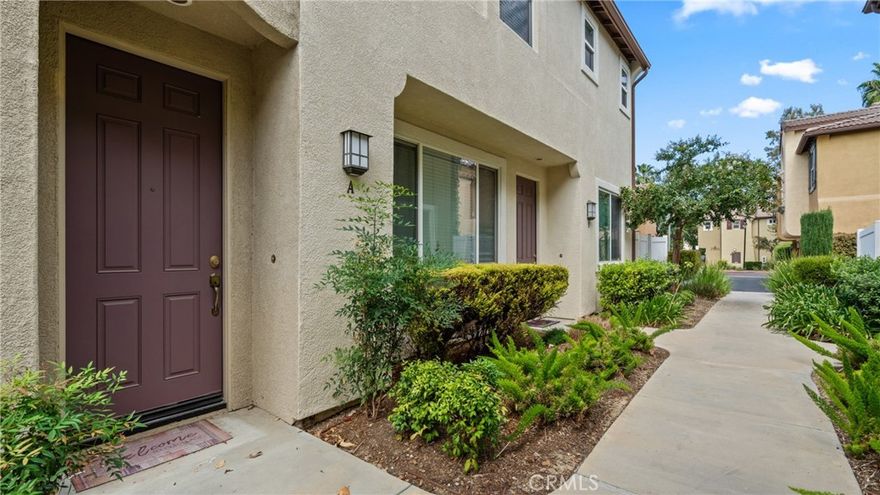 Beautifully maintained 2-bedroom, 2-bathroom condo with private garage and direct home access.** This inviting home features an upgraded fireplace and elegant wood staircase, adding warmth and style. The kitchen shines with brand-new stainless steel appliances and updated cabinets. Both bathrooms include grab bars in the showers for enhanced safety and convenience. A rare find with a private garage offering direct entry—comfort, functionality, and thoughtful updates throughout. Move-in ready!