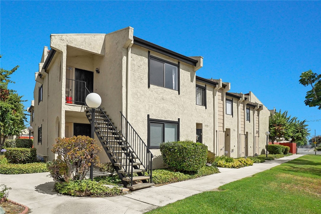Welcome to this beautifully kept gated end unit condo! This upstairs unit offers the perfect blend of natural light and an open layout that instantly feels like home. Step inside and you’re be greeted with the cathedral ceiling in the living room, new vinyl flooring throughout the house and a formal dining area perfect for entertaining. Enjoy the convenience of laundry inside unit, two parking spaces (one covered, one open), and access to community pool, spa and clubhouse. Whether you're a first-time buyer, investor, or downsizing, this home offers comfort, convenience and a wonderful place to create lasting memories.
