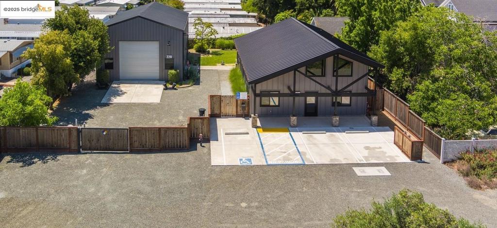 +\ 3,400 sf between two newly constructed buildings (2023). Mixed use/ office building set up for multiple uses. Shop set up for commercial and/or private use. Currently zoned IL - Limited Industrial, but can possibly be re-zoned for residential use.