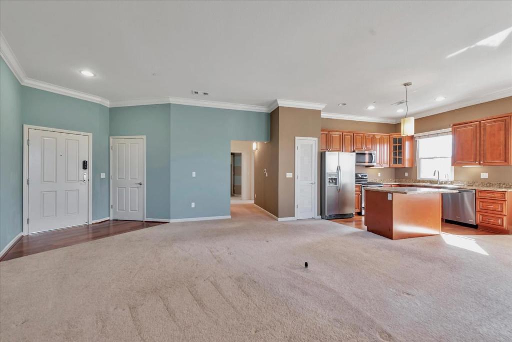Spacious 2 bed 2 full bath, top floor penthouse offering luxury living in the heart of Silicon Valley. Enjoy designer finishes throughout (this was a former model unit), soaring 10 ft. ceilings, bright, open and roomy corner unit with Southern and Western exposure on 2 sides. Large Balcony with mountain views, Granite counters and island in kitchen; cherrywood cabinets; stainless appliances. Large master suite with walk in closet and gorgeous bathroom. In Unit Washer/Dryer. 2 spots in a secure underground garage. The community offers access to private pool, fitness center, spa, and BBQ area! Located just minutes from downtown Campbell, Willow Glen, downtown San Jose, Rose Garden, Valley Fair, San Jose Airport, and just a walk to Los Gatos Creek Trail. Rent includes water, sewer and garbage. No pets, good credit, non-smokers