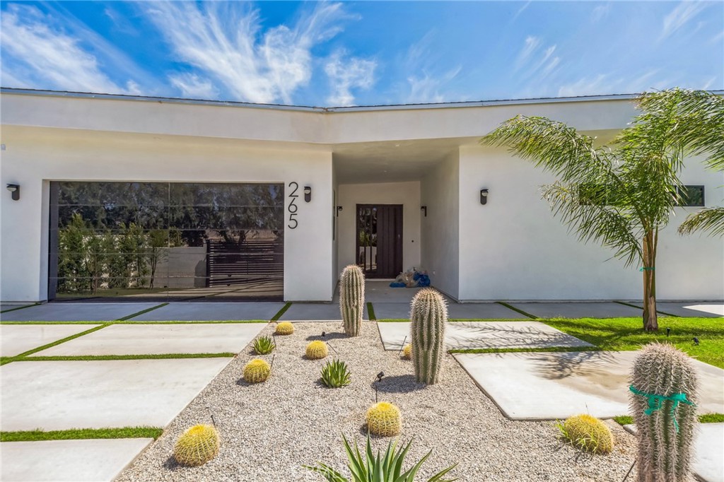 NEW CONSTRUCTION-A true mid-century modern masterpiece, where form meets function in stunning Butterfly-style architecture — a rare and iconic find nestled in the Palm Springs.
This architectural beauty is a celebration of clean lines, dramatic rooflines, and seamless indoor-outdoor flow. The soaring butterfly roof creates an airy, open interior flooded with natural light, while framing breathtaking mountain views and desert skies.
Every detail of this home is crafted to impress: from the expansive glass sliding door and polished stylish floors to the custom kitchen, designer fixtures, and serene bedrooms that invite relaxation. The open-concept living space flows effortlessly to the resort-style backyard, complete with a sparkling pool, lush landscaping, and tranquil outdoor lounge areas perfect for entertaining or soaking up the sun.
This timeless stunner is more than a home — it’s a piece of architectural accent and a rare opportunity to own a design-forward property that defines desert luxury.
Experience Palm Springs living at its most iconic. Short term vacation rental license is available.