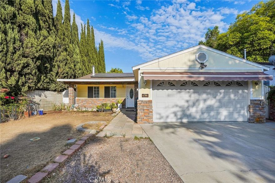 Your Dream Awaits in North Hollywood! Welcome to 5810 Denny Avenue, a rare opportunity in the heart of NoHo. This versatile property offers not just one, but two fully permitted living spaces, making it the perfect fit for multi-generational living, a guest retreat, or income-producing potential.

The main residence features 3 bedrooms and 2 bathrooms, with recent upgrades designed for comfort and peace of mind. Gorgeous bamboo flooring runs throughout, while soaring ceilings with dual skylights fill the open-concept living space with natural light. The layout is inviting and flexible, ready to complement your unique lifestyle. Additional highlights include an attached two-car garage, plus upgraded systems including a newer water heaters, main water line, and electrical panel. At the front, a sleek electric gate leads to a driveway with parking for two vehicles.

Tucked privately at the rear, the separate back unit was thoughtfully constructed with the home in 1992 and is fully permitted. This self-contained 1-bedroom, 1-bathroom space includes a full kitchen, living area, and a private entrance from the alley, offering a true sense of independence. Whether you envision it as a guest house, rental unit, or creative studio, the possibilities are endless. Located just minutes from the vibrant NoHo Arts District, Universal Studios, and major studios like Disney and Warner Brothers, this property delivers the ideal blend of style, convenience, and opportunity.

5810 Denny Ave is more than a home, it’s a smart investment in comfort, flexibility, and future potential.