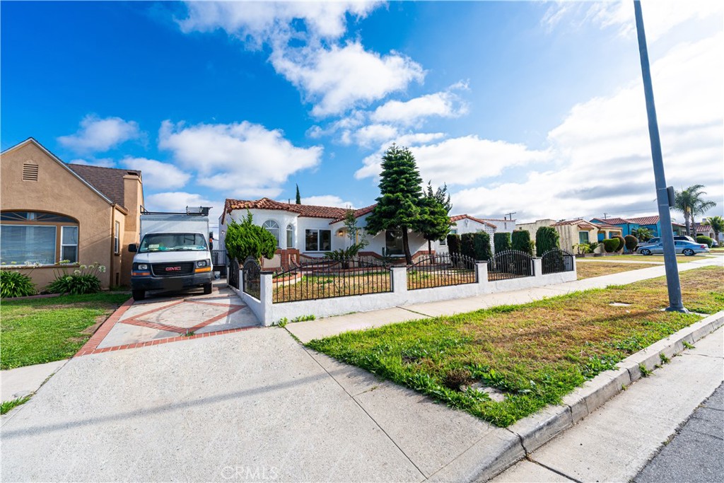 This fully remodeled 3-bedroom, 2-bathroom home with a dedicated office in Manchester Square offers a perfect blend of style and convenience—just 2.6 miles from SoFi Stadium! Step into a bright, open-concept living area with new laminate floors and a fireplace. The kitchen is a chef’s dream, with new cabinets, quartz countertops, and brand-new appliances. Bathrooms have been upgraded with new tiles and fixtures. New electrical fixtures, switches, and windows bring a modern touch to every room. Fresh interior and exterior paint throughout. The spacious backyard is ideal for outdoor dining and entertaining, and there’s ADU potential with a detached 2-car garage. Just minutes from SoFi, the upcoming Intuit Dome, and more! Don’t miss this stunning home—schedule your showing today!