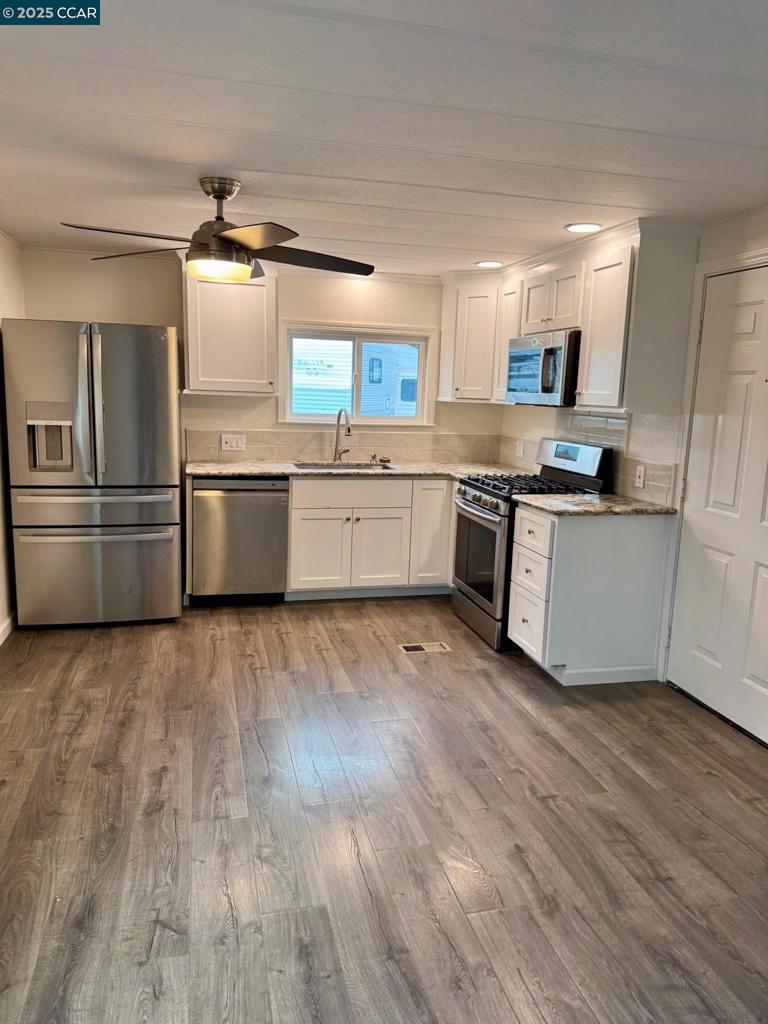 Remodeled 1BR/1BA – Low $850 Space Rent in All-Age Park! Beautifully updated single-wide home featuring nice flooring, fresh paint, new double pane windows, and a modern kitchen with stainless steel appliances, granite countertops, and white cabinets. Spacious bedroom with ample closet space and a sleek bathroom. Enjoy plenty of natural light, and private parking right at your door. Located in a well-maintained all-age park with low space rent of $850/month. Close to shopping, dining, and major freeways—low-maintenance living at its finest! Fireplaces: NO