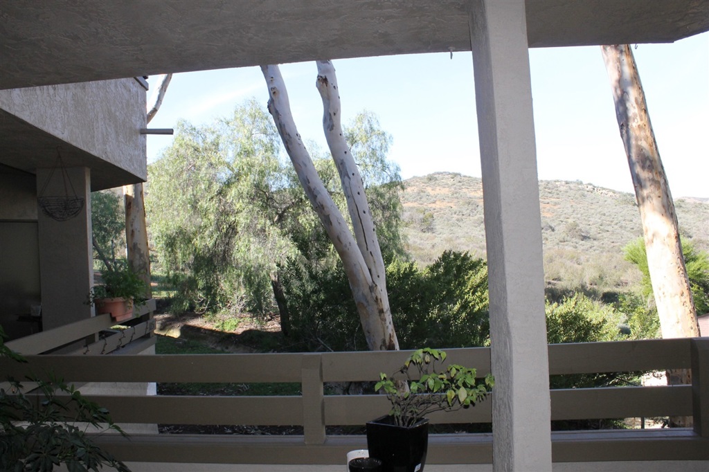 Desirable Highland Trails complex! First floor unit. Unit borders the edge of Mission Trails Regional Park. Park views from every room as well as covered patio. Fireplace, high ceilings w/ fans and wood floors. Neighborhoods: West Hills Equipment: Garage Door Opener,Pool/Spa/Equipment, Range/Oven, Satellite Dish Other Fees: 0 Sewer: Sewer Connected Topography: RSLP