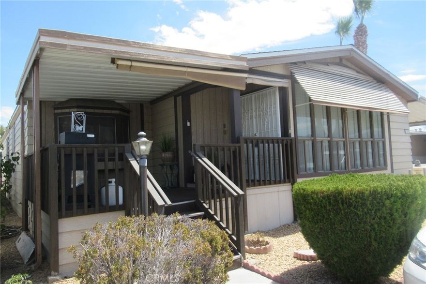 Triple-Wide Beauty in Gold West Mobile Home Park 

Step into this spacious 2-bedroom, 2-bath, on a desirable corner lot. With a thoughtful layout this home blends comfort with convenience.

Inside, features a large living room with newer laminate flooring, a cozy fireplace, and built-in bar—perfect for entertaining.  A bright kitchen with dining nook plus a separate dining room for larger gatherings.  A dedicated laundry room with office space to keep work and home life organized.

Two generously sized bedrooms and two full bathrooms for plenty of living space. Outside, enjoy a front patio, small rear yard, two storage sheds, and a covered carport. The roof was replaced just last year, giving you peace of mind for years to come.  This triple-wide offers the space, storage, and style you’ve been looking for—don’t miss your chance to make it yours!